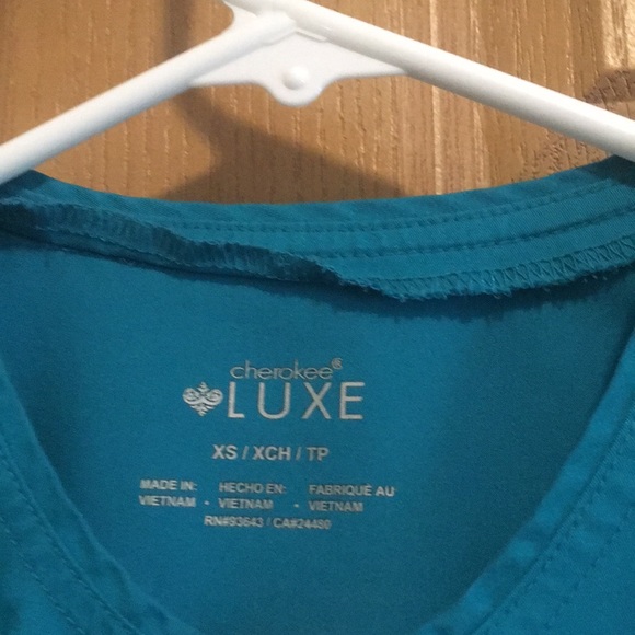 Cherokee Luxe Snap Front Warm Up Jacket in teal - Picture 6 of 6